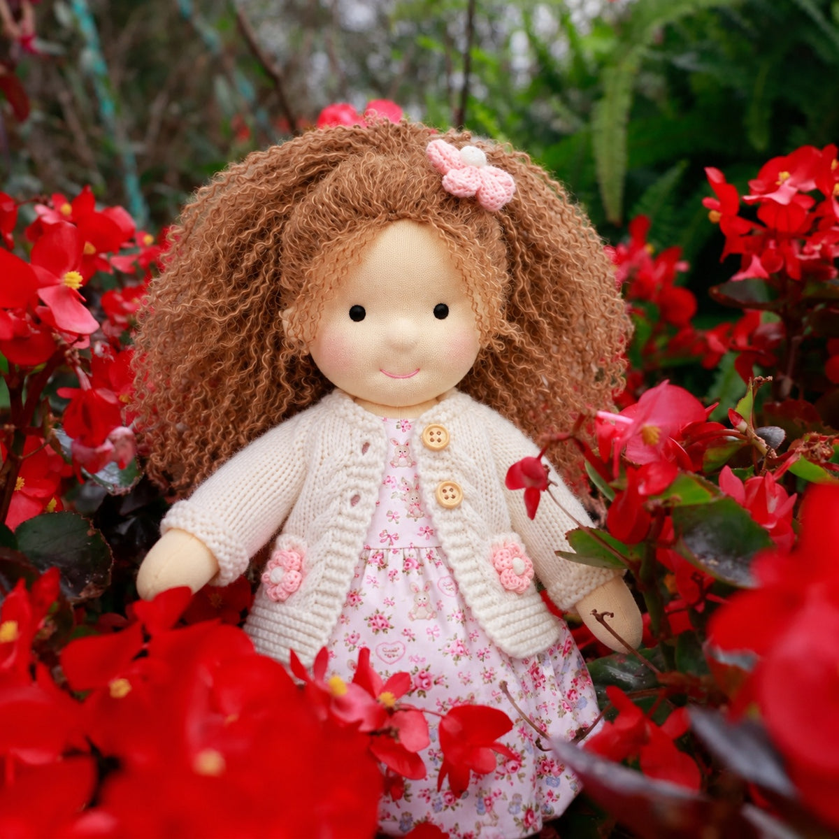 BlissfulPixie 12-Inch Waldorf-Style Doll with Brown Curly Hair, Pink Bow Hair Clip, Cream Knitted Cardigan, Bunny Print Dress & White Mary Jane Shoes – Cute Gift for Kids