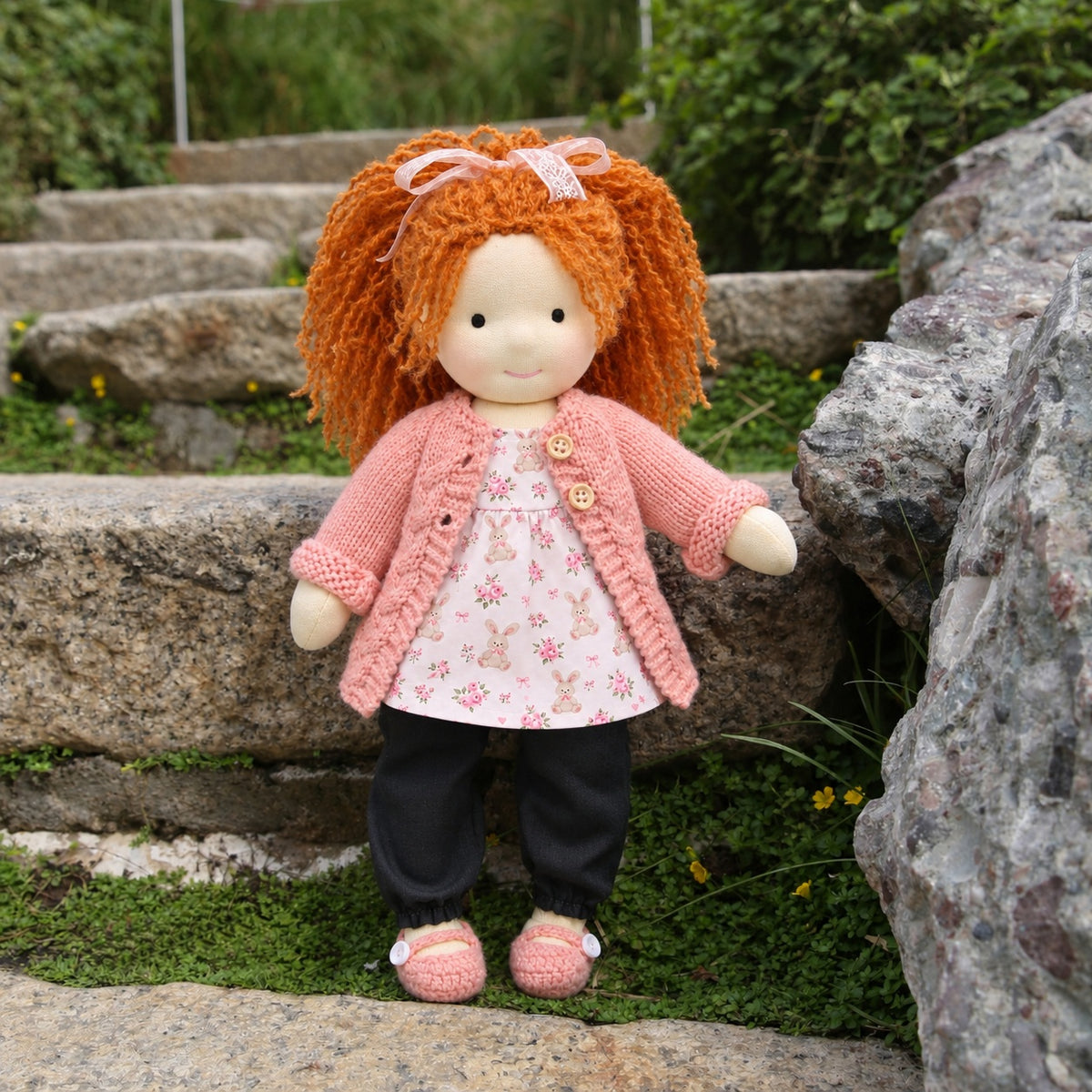 BlissfulPixie 12-Inch Waldorf-Style Doll with Orange Curly Hair, Pink Knitted Cardigan, Bunny Floral Print Top, Black Pants & Pink Knitted Shoes – Cute Gift for Kids