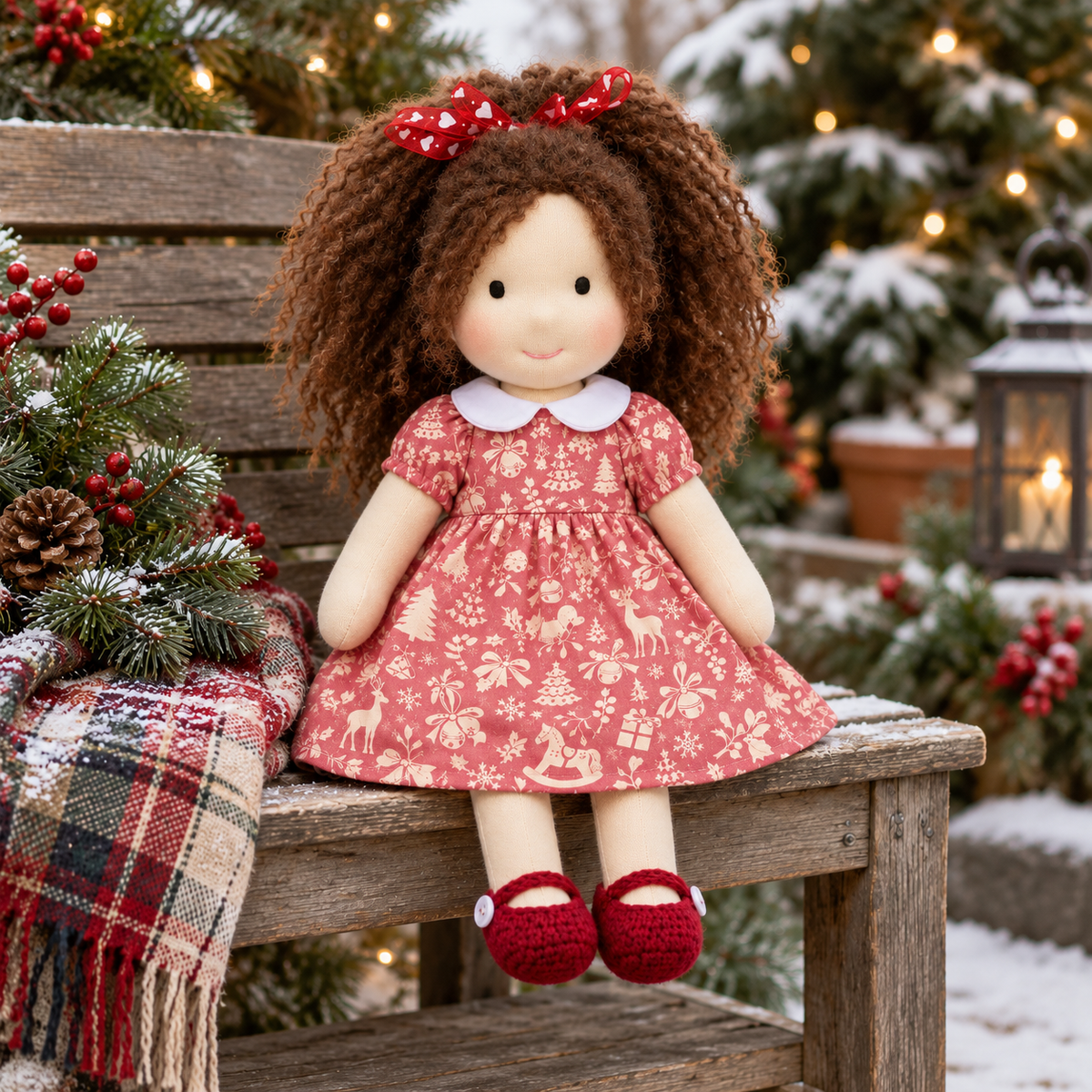 BlissfulPixie 12-Inch Handmade Waldorf Christmas Doll with Brown Curly Hair, Red Heart Bow, Pink Holiday Dress & Red Knitted Shoes – Christmas Gift for Kids